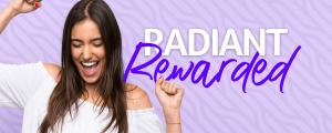 Long haired female presenting person in a white shirt excitedly raising fists into the air next to the words Radiant Rewarded.